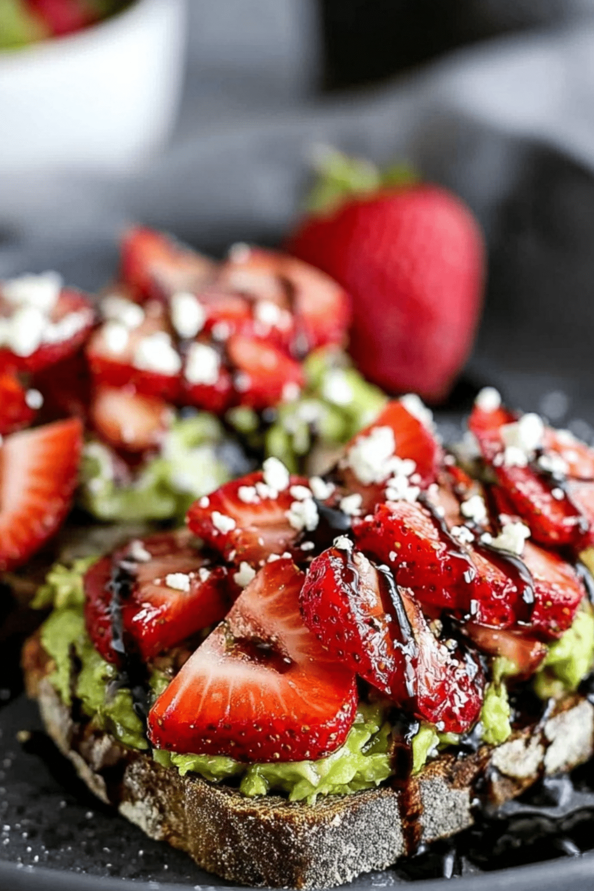 Balsamic Strawberry Avocado Toast with balsamic glaze and feta