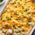 Cheesy chicken and rice casserole with melted cheese