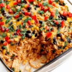 Easy Chicken Burrito Casserole baked with rice, beans, and cheese