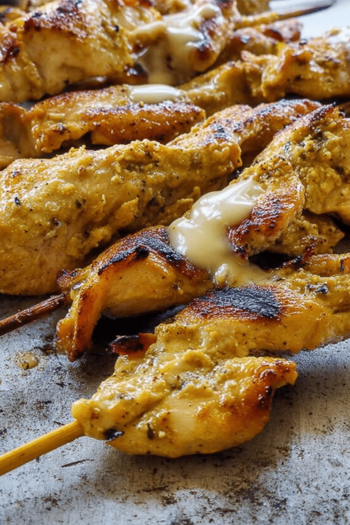 Grilled Chicken with Alabama White Sauce served on a plate
