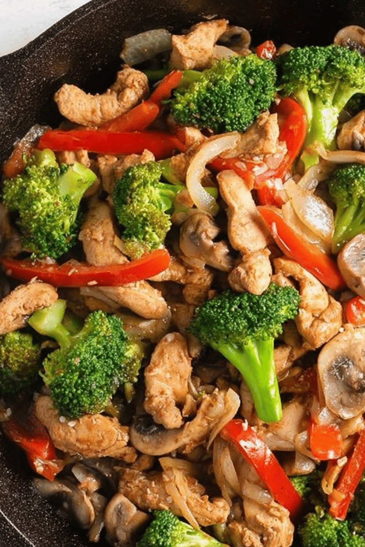 Keto Low Carb Chicken Stir Fry with chicken, broccoli, and bell peppers