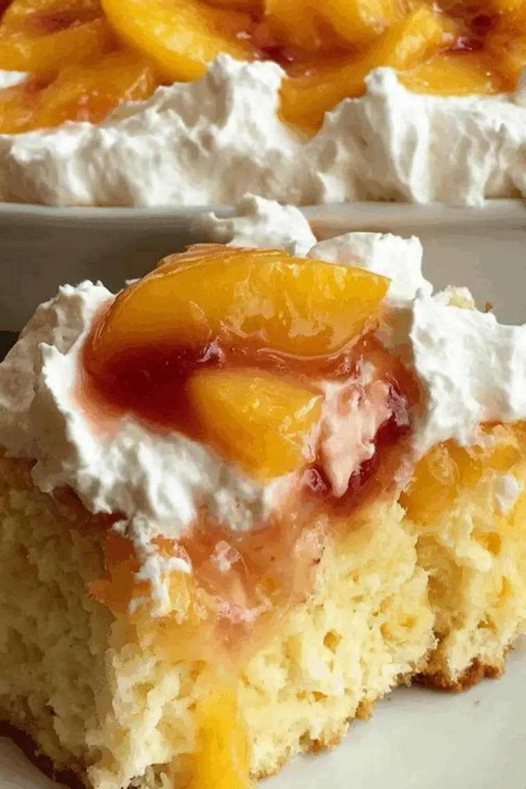 Peaches and Cream Poke Cake with fresh peaches and whipped topping