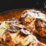 Texas Roadhouse Smothered Chicken with melted cheese and sautéed mushrooms