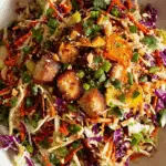 Asian Chicken Crunch Salad with crispy chicken and peanut dressing