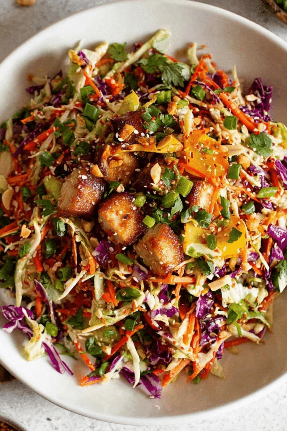 Asian Chicken Crunch Salad with crispy chicken and peanut dressing