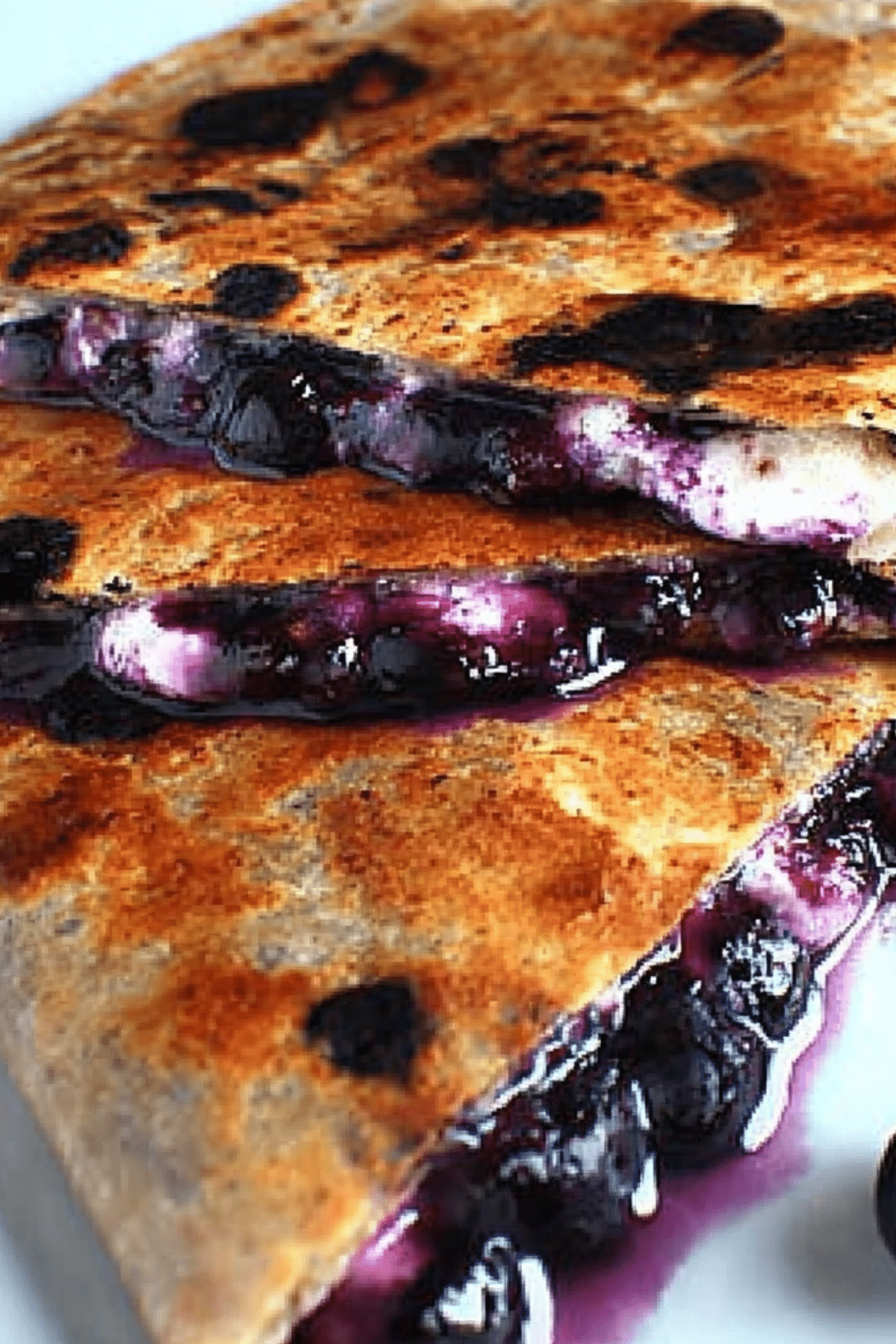Blueberry Breakfast Quesadilla with cinnamon cream cheese and blueberries