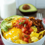 Breakfast Burrito Bowl recipe with eggs, salsa, and avocado