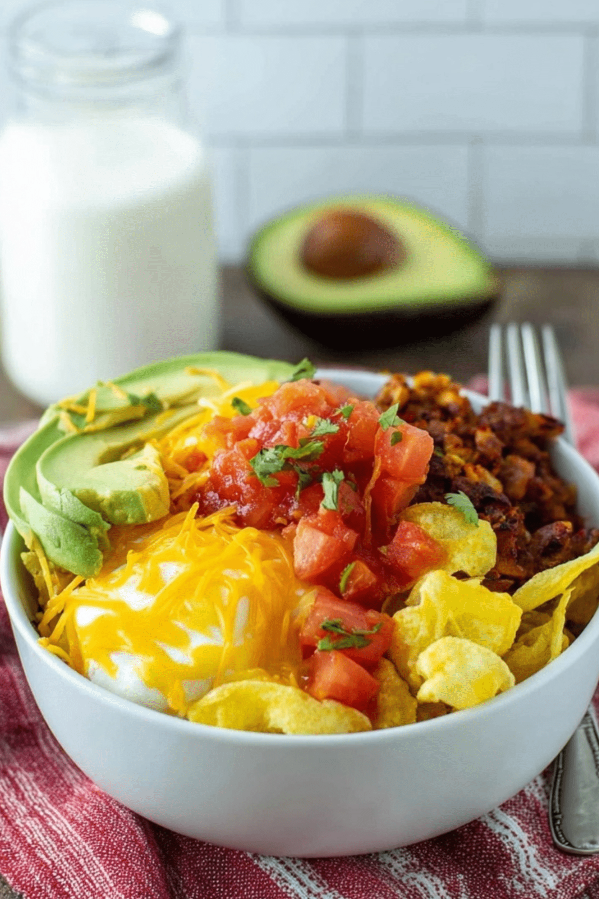 Breakfast Burrito Bowl recipe with eggs, salsa, and avocado