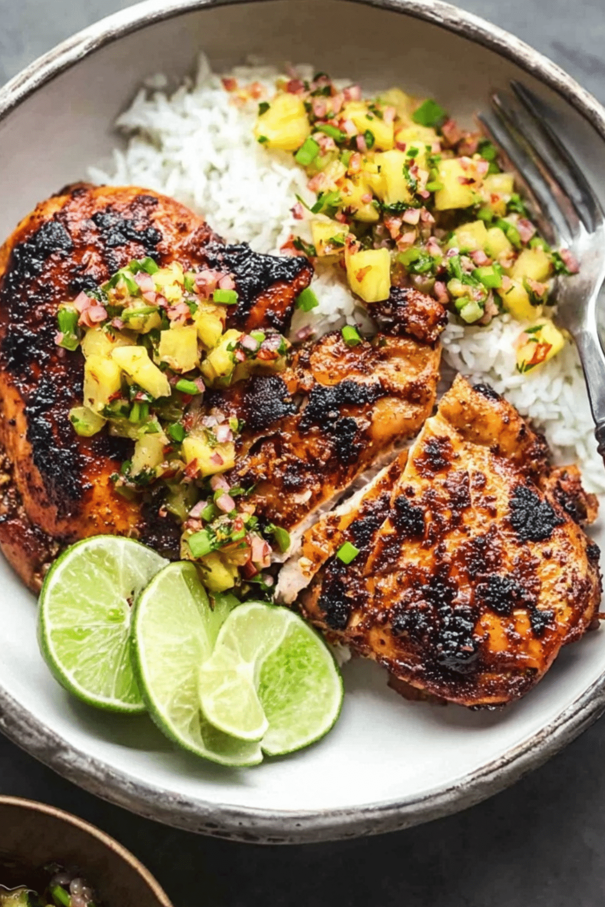 Caribbean Jerk Chicken with Pineapple Salsa served over rice