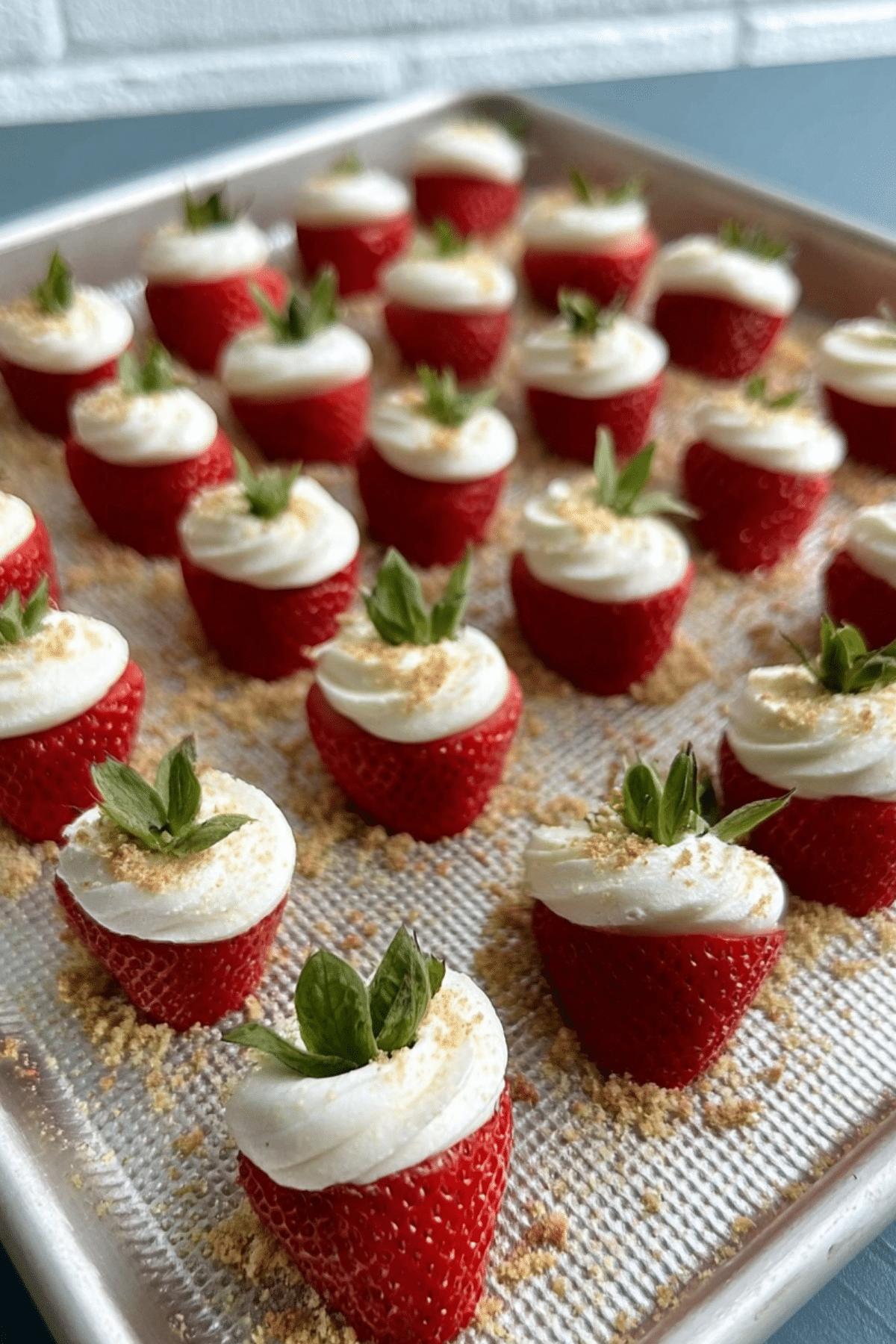 Cheesecake Deviled Strawberries filled with creamy cheesecake and topped with graham cracker crumbs
