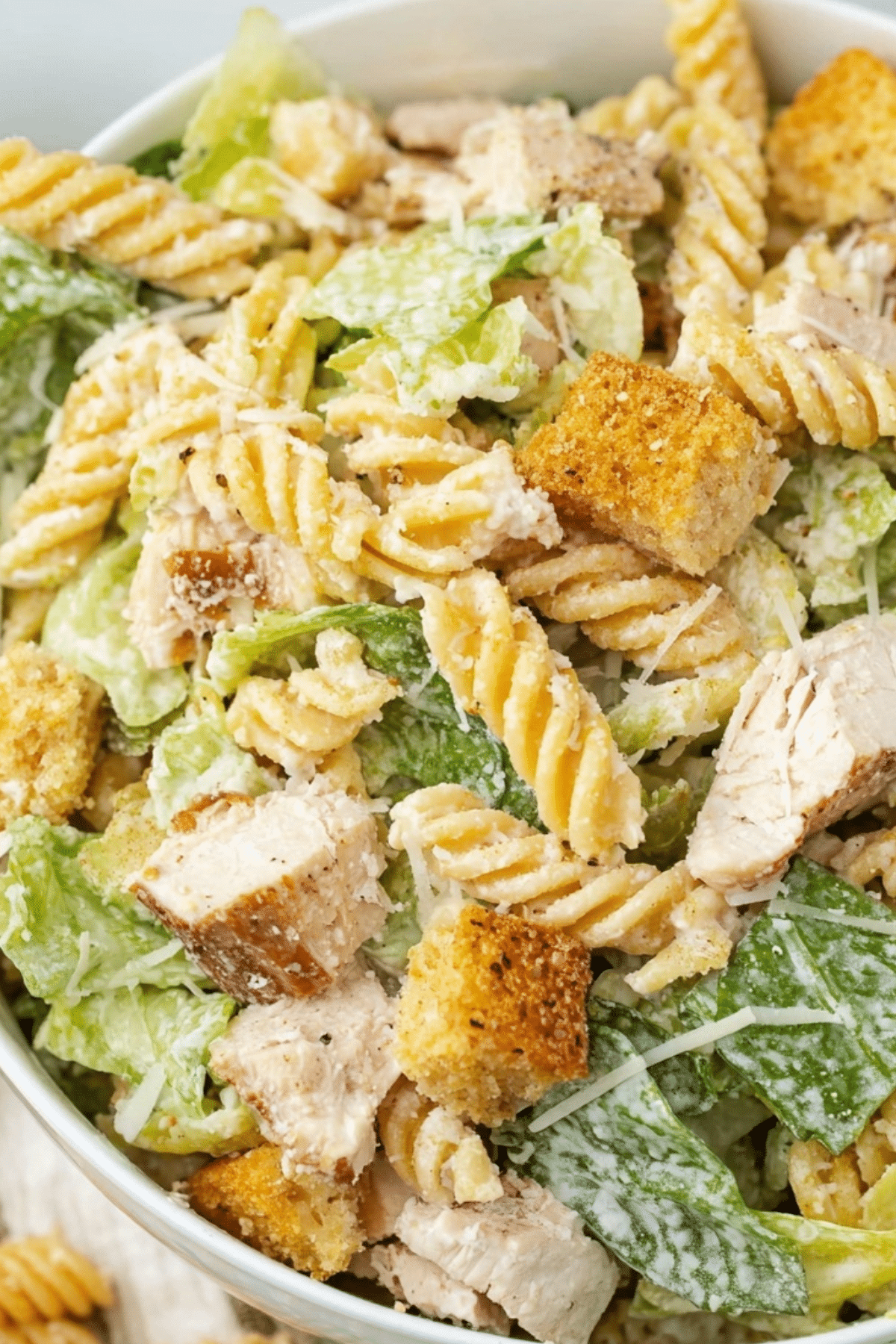 Chicken Caesar Pasta Salad with romaine, rotini, and parmesan