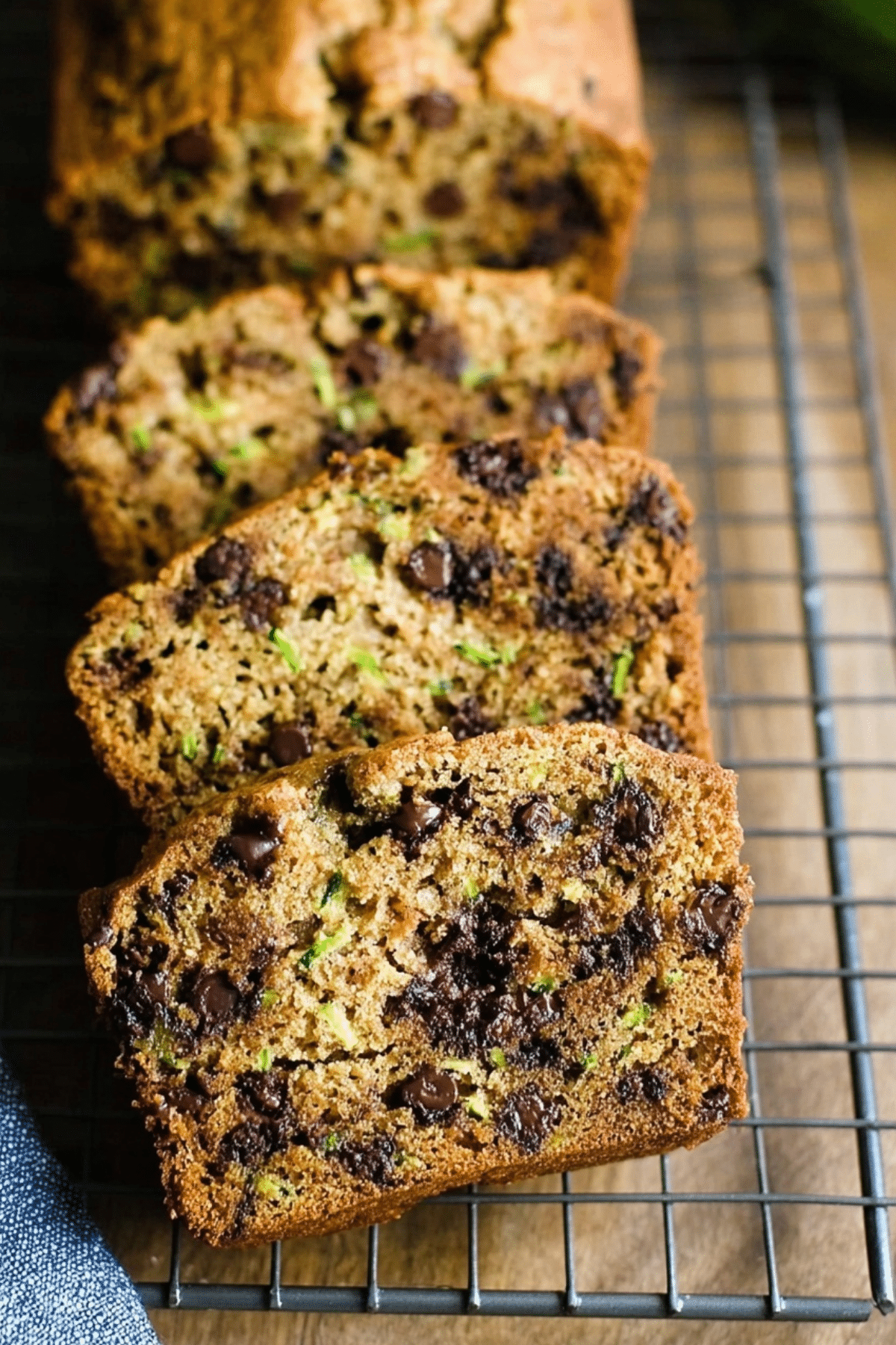 Moist chocolate chip zucchini bread loaf with sliced pieces
