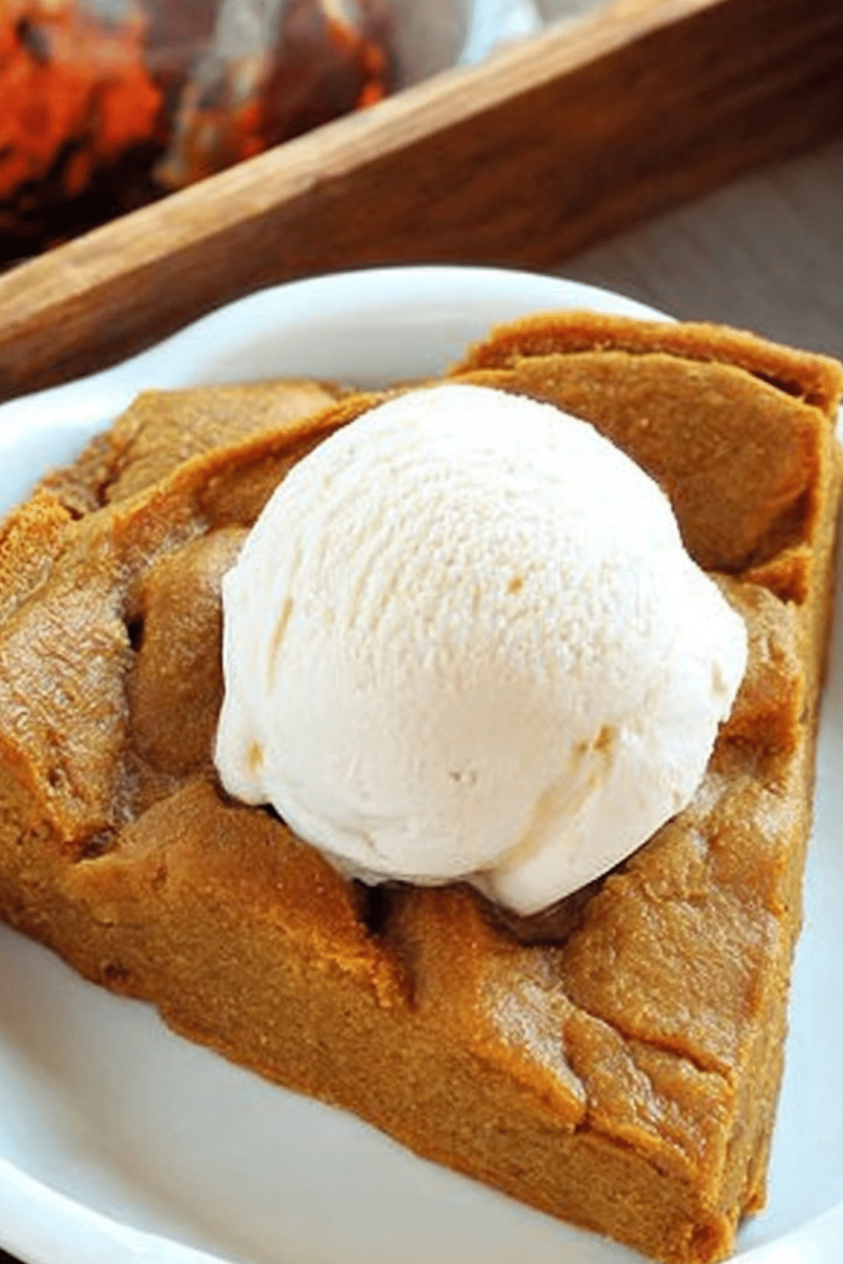 Crustless pumpkin pie slice served on a plate"