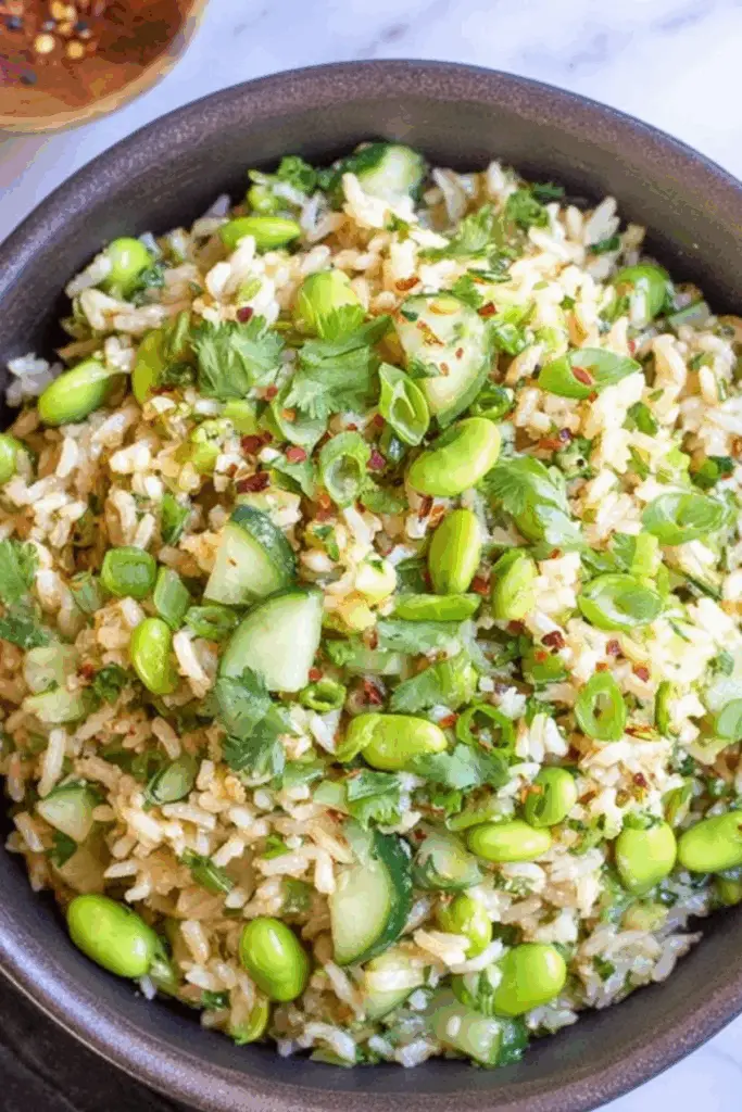 Cucumber Edamame Rice Salad with sesame dressing and avocado