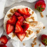 Greek Yogurt Rice Cake topped with strawberries and honey