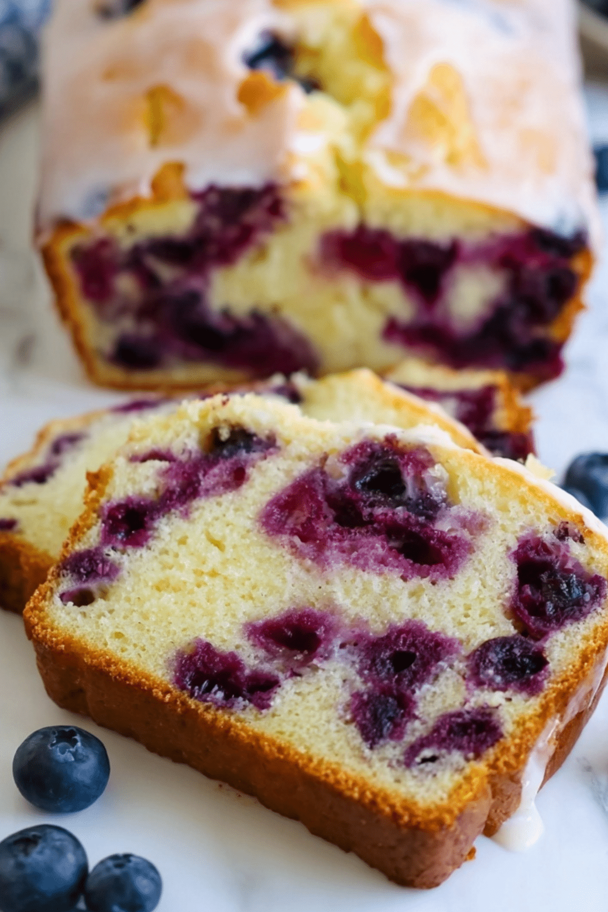 Lemon Blueberry Bread recipe with fresh blueberries and lemon glaze