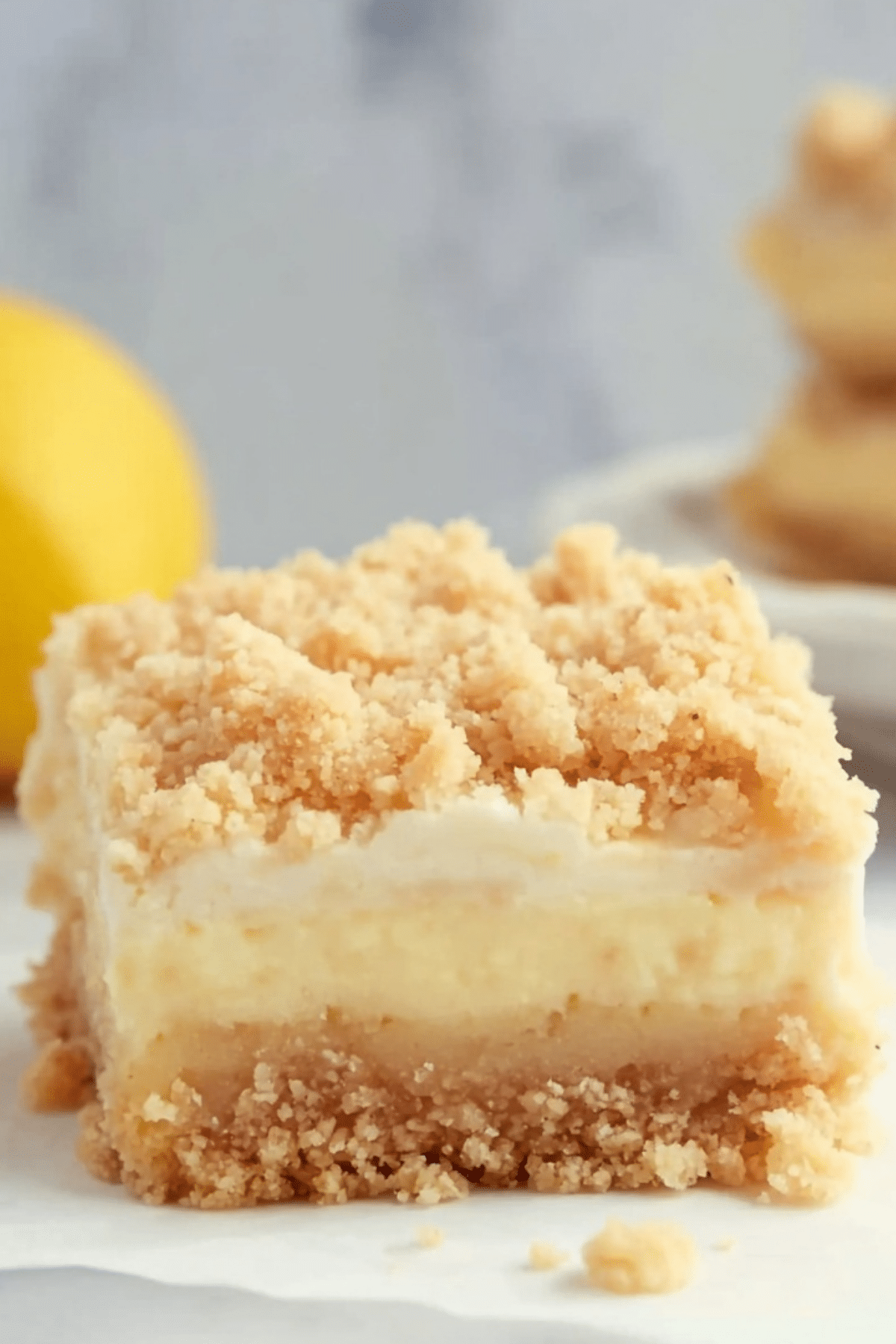 Lemon Cheesecake Crumb Bars with a creamy filling and oat crumble topping