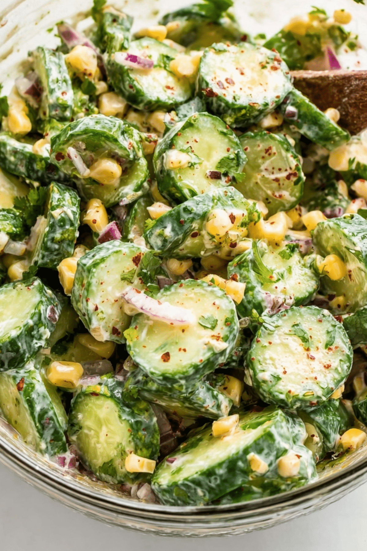 Mexican Cucumber Salad with cotija cheese, corn, and cilantro"