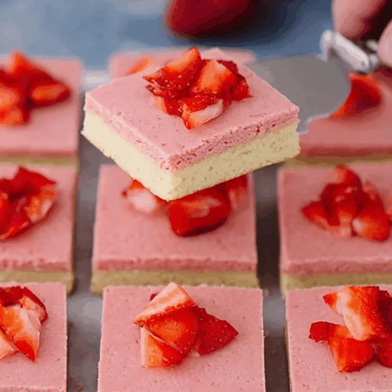 Strawberry Sugar Cookie Bars with homemade strawberry frosting