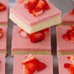 Strawberry Sugar Cookie Bars with homemade strawberry frosting