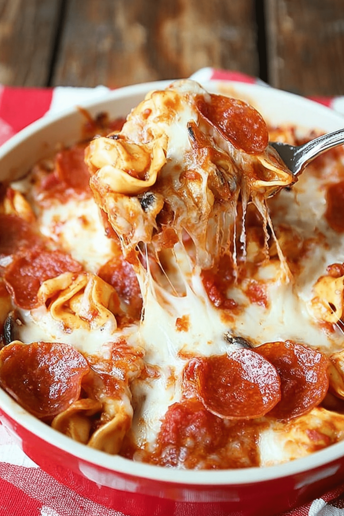 Baked Pizza Tortellini with melted cheese and pepperoni