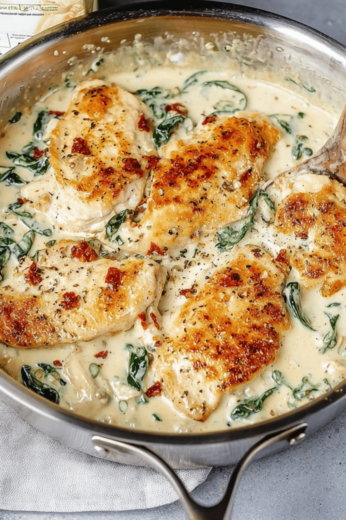 Creamy Boursin Chicken served on a plate with creamy sauce