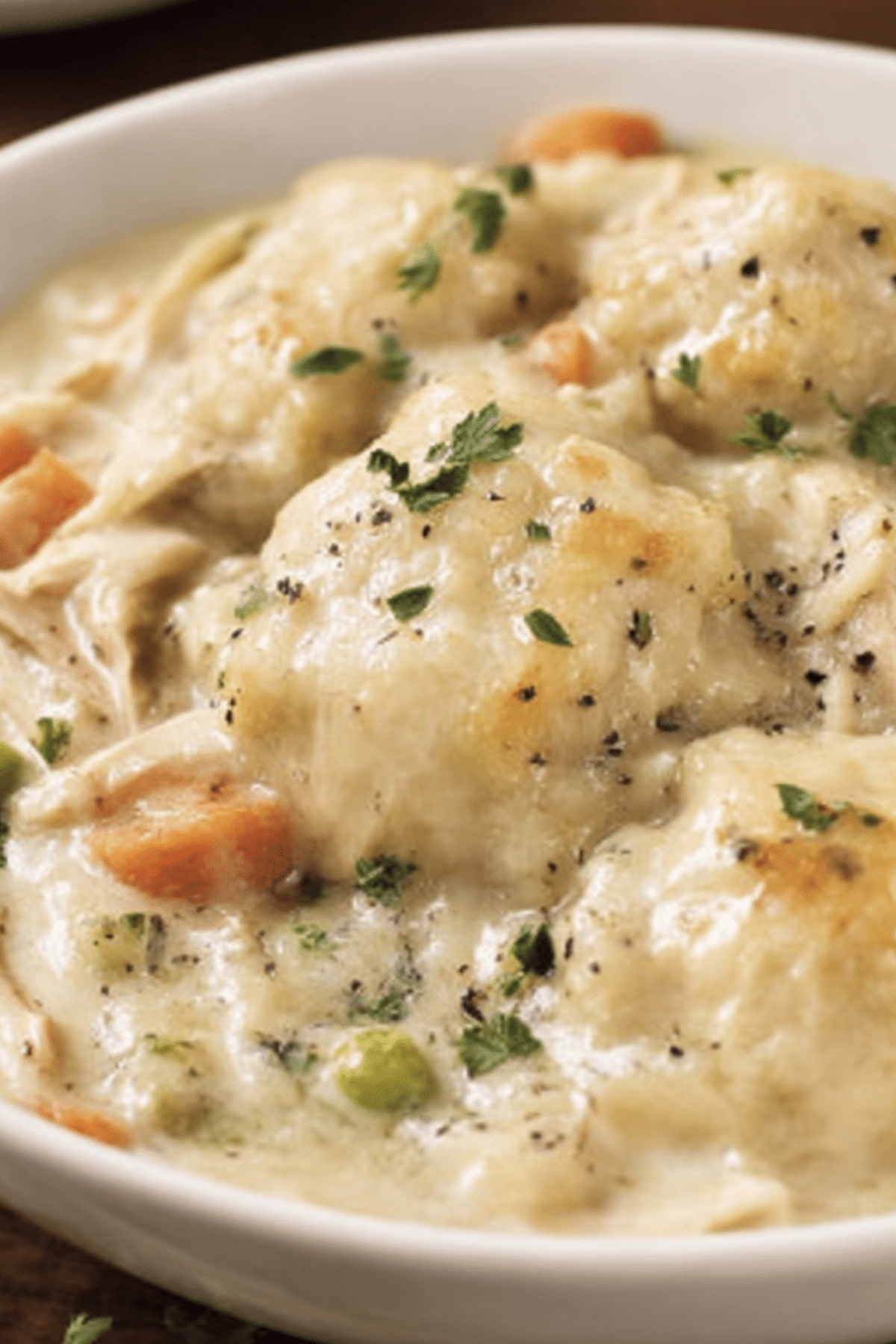 Crockpot Chicken & Dumplings with tender chicken, creamy broth, and fluffy dumplings