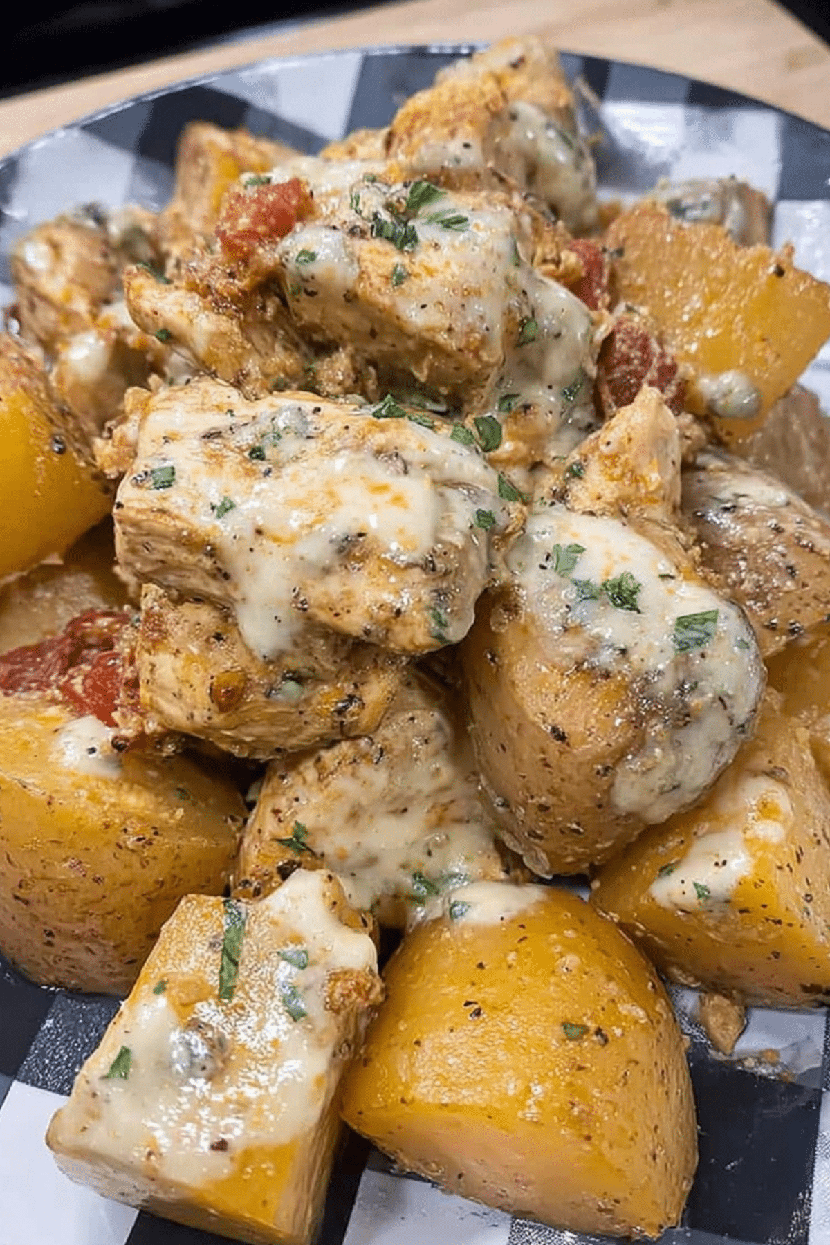 Crockpot Garlic Parmesan Chicken Potatoes recipe with tender chicken and seasoned potatoes
