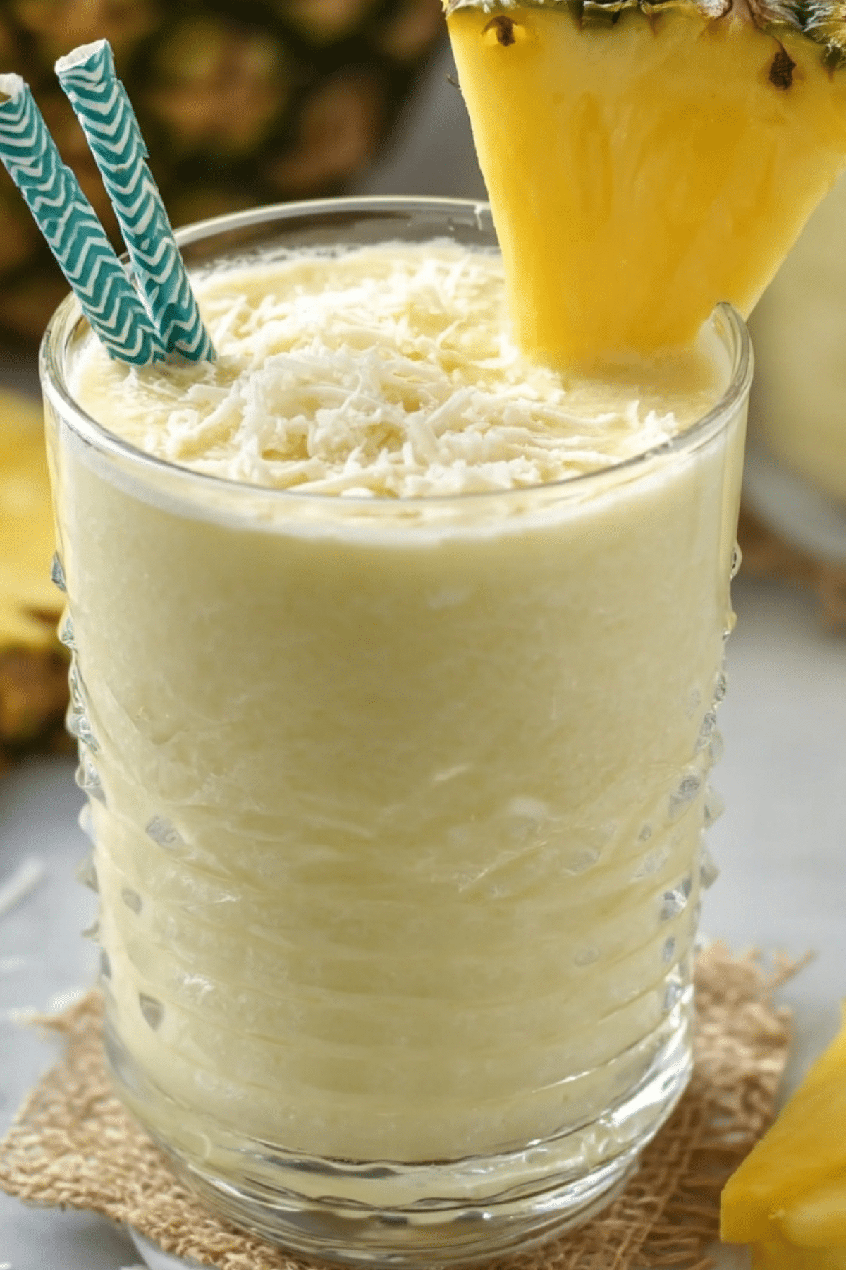 Piña Colada Smoothie with coconut and pineapple ingredients
