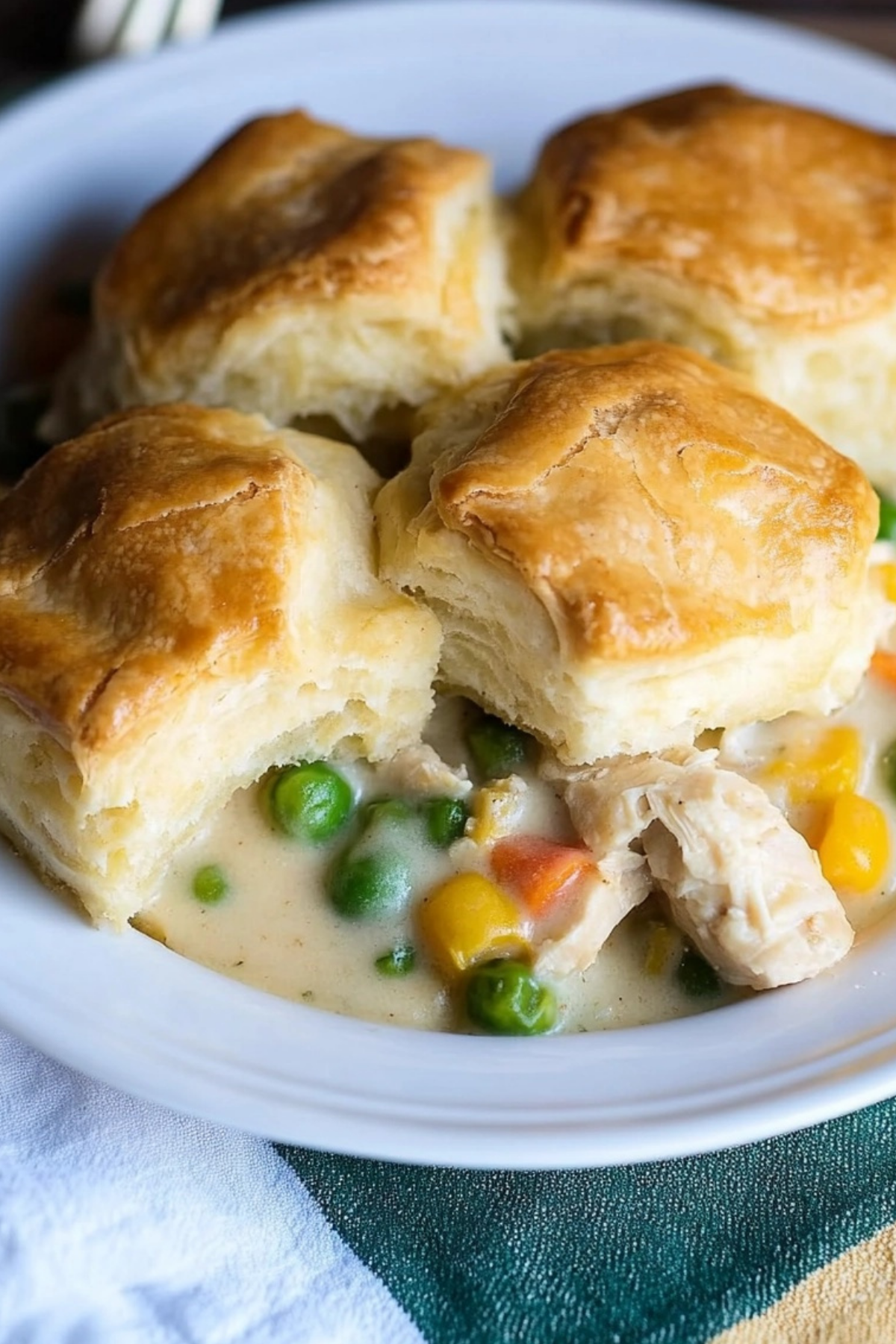 Chicken Pot Pie with Biscuits in casserole dish topped with golden biscuits