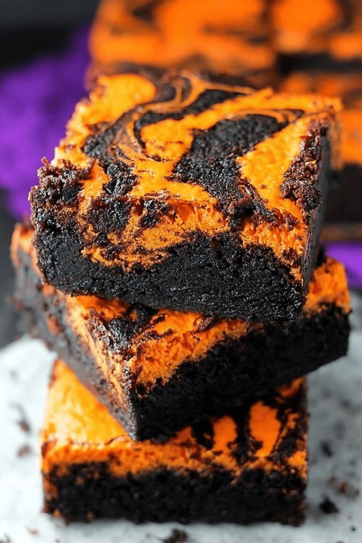 Halloween Swirl Cream Cheese Brownies with orange cheesecake topping