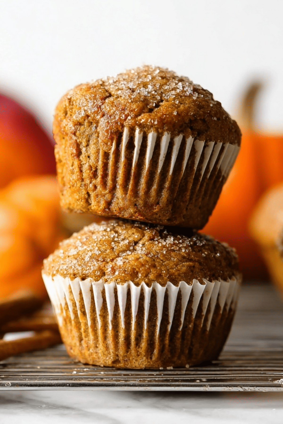 freshly baked pumpkin muffins with golden tops