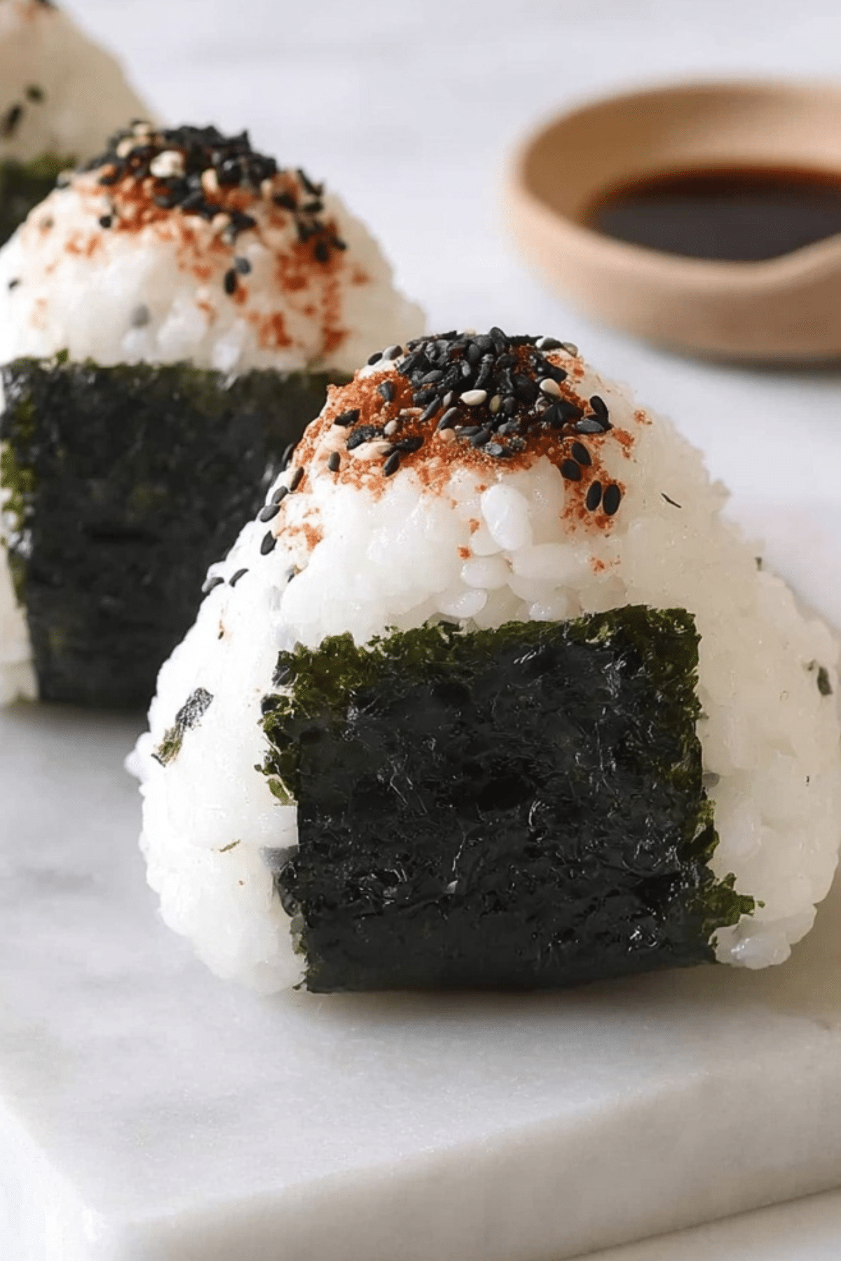 Spicy Tuna Onigiri recipe with creamy tuna, spicy mayo, and crispy nori