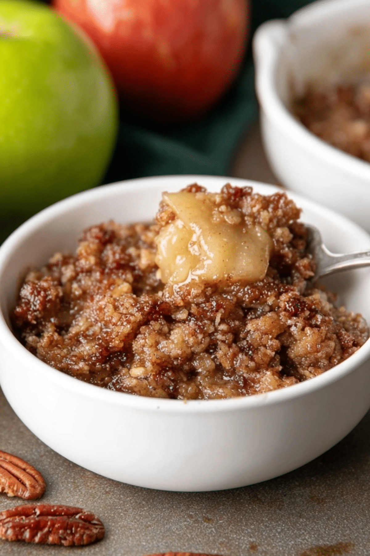 Apple crumble with brown butter pecan topping served warm
