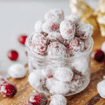 Candied cranberries coated in powdered sugar, a sweet and tart holiday treat