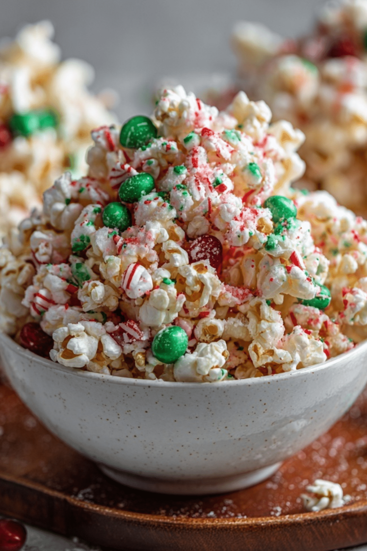 Christmas Popcorn Candy decorated with M&Ms and candy canes