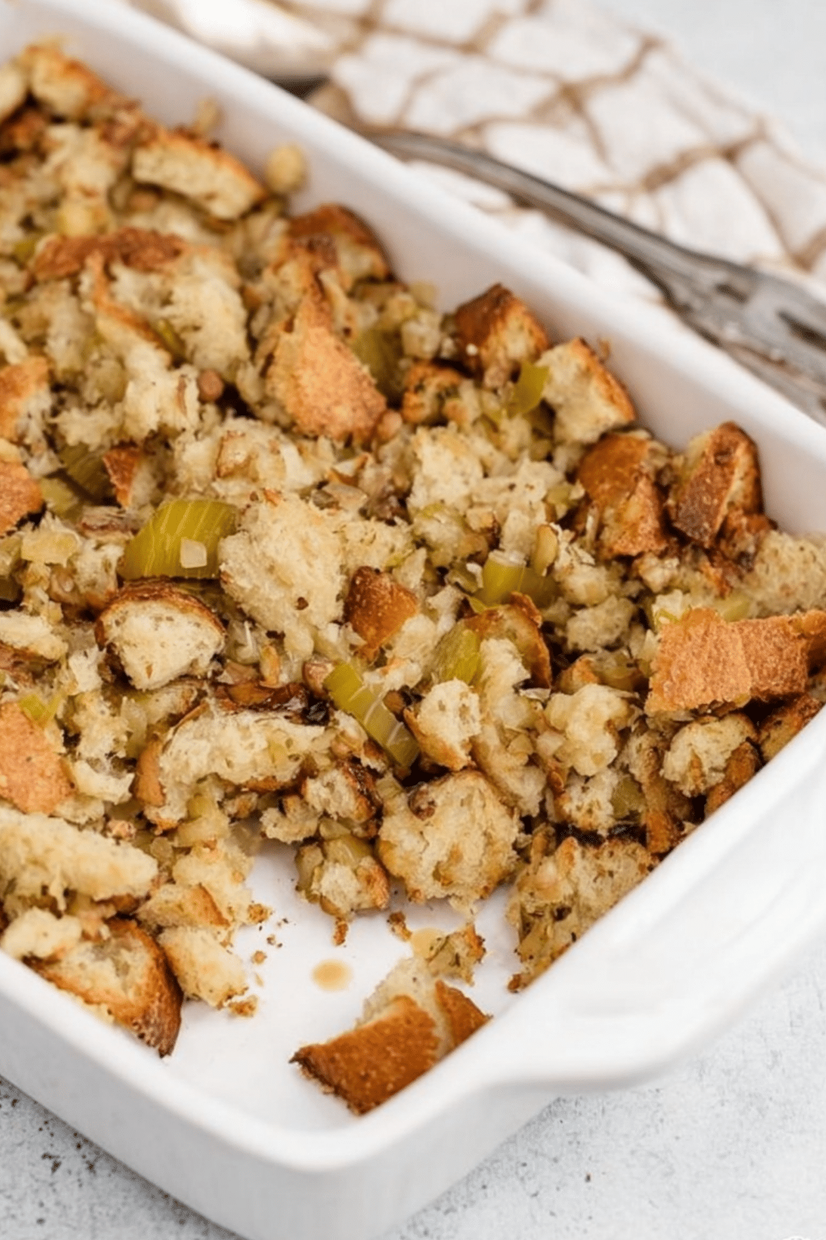 Homemade Thanksgiving Stuffing baked in dish with golden crust