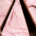 Pink marble cake with swirls of pink, chocolate, and vanilla