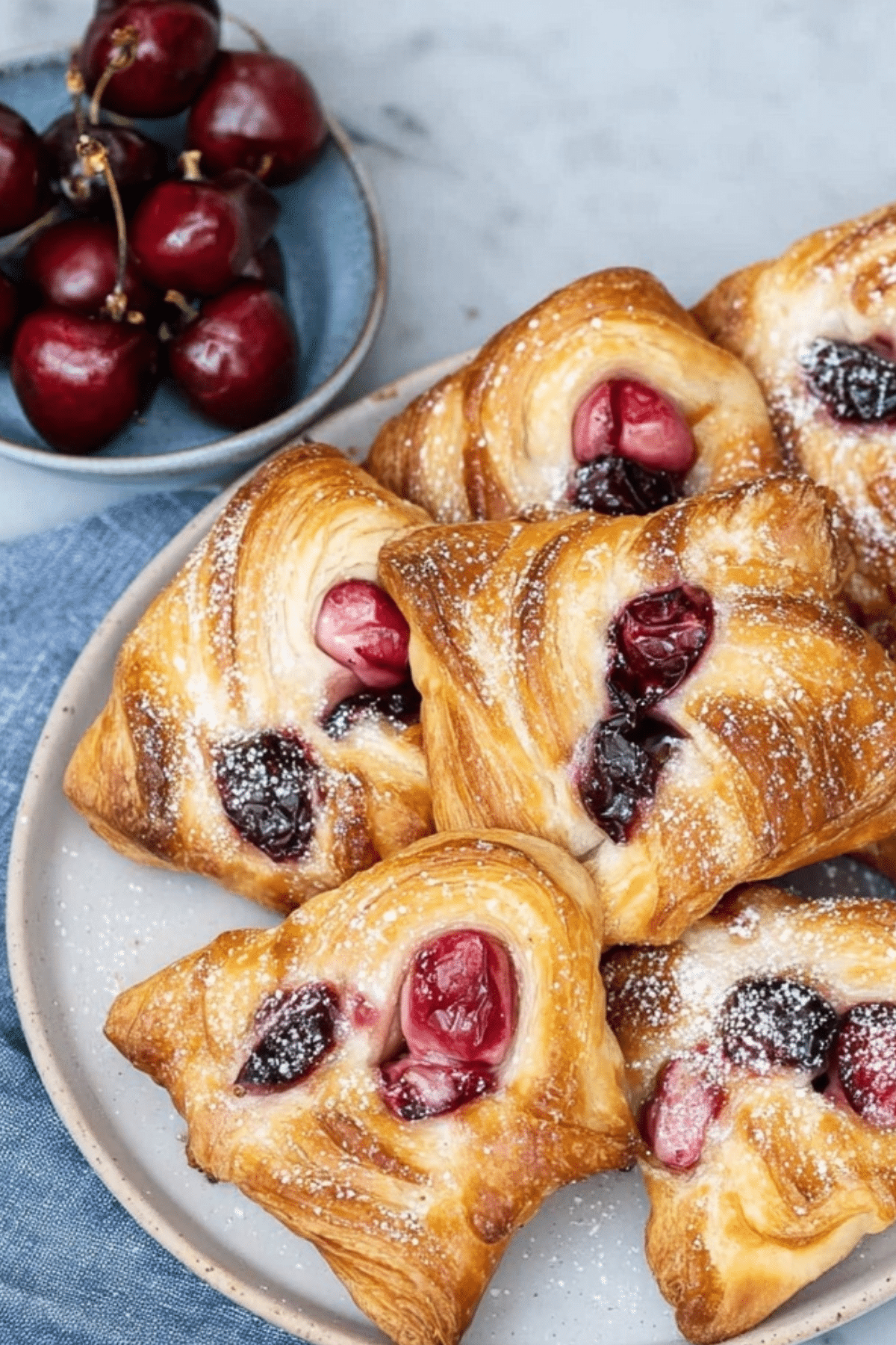 Flaky cherry danish with puff pastry and cream cheese filling