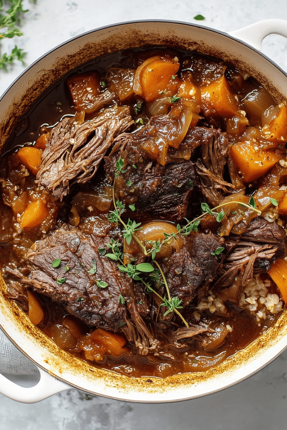 cider braised pot roast with caramelized onions and cauliflower rice