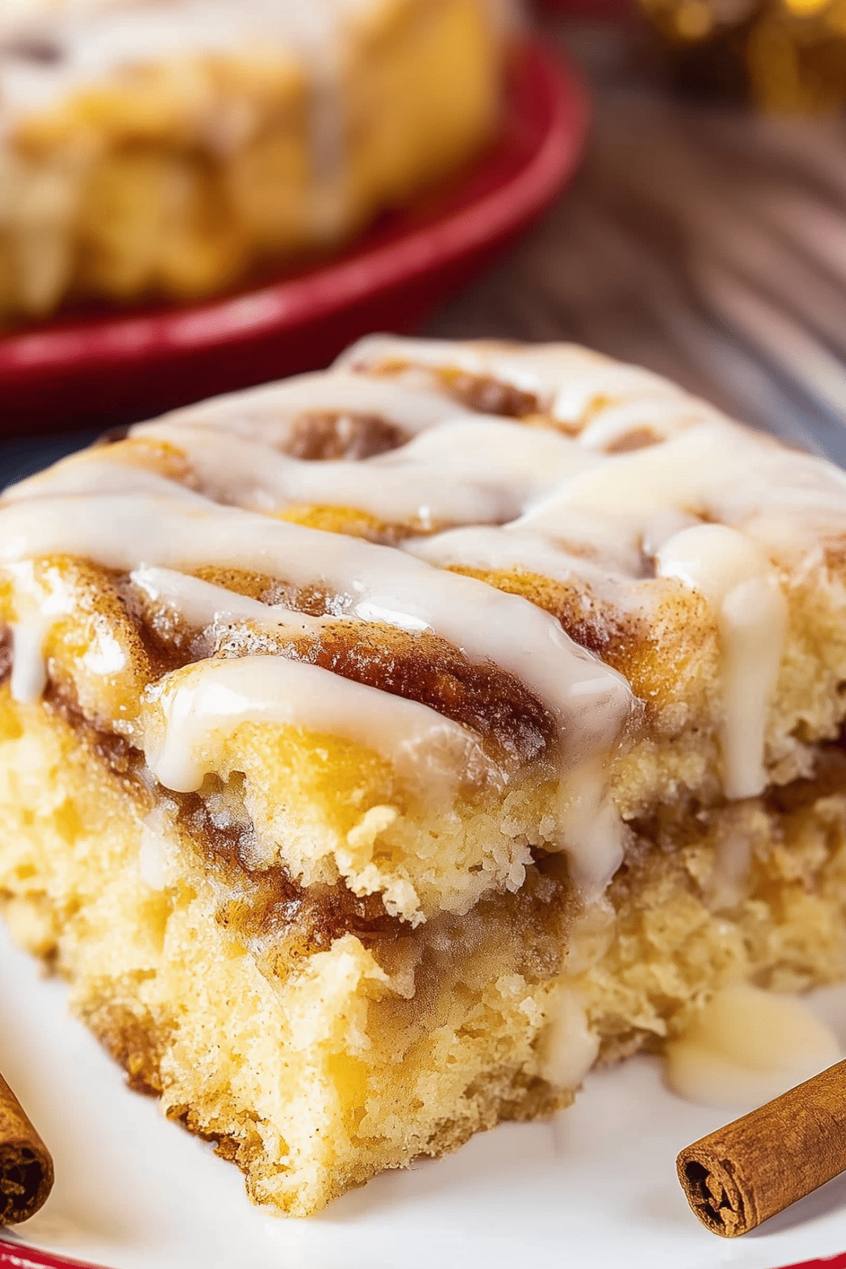 Homemade Cinnamon Roll Cake with vanilla glaze and cinnamon swirls