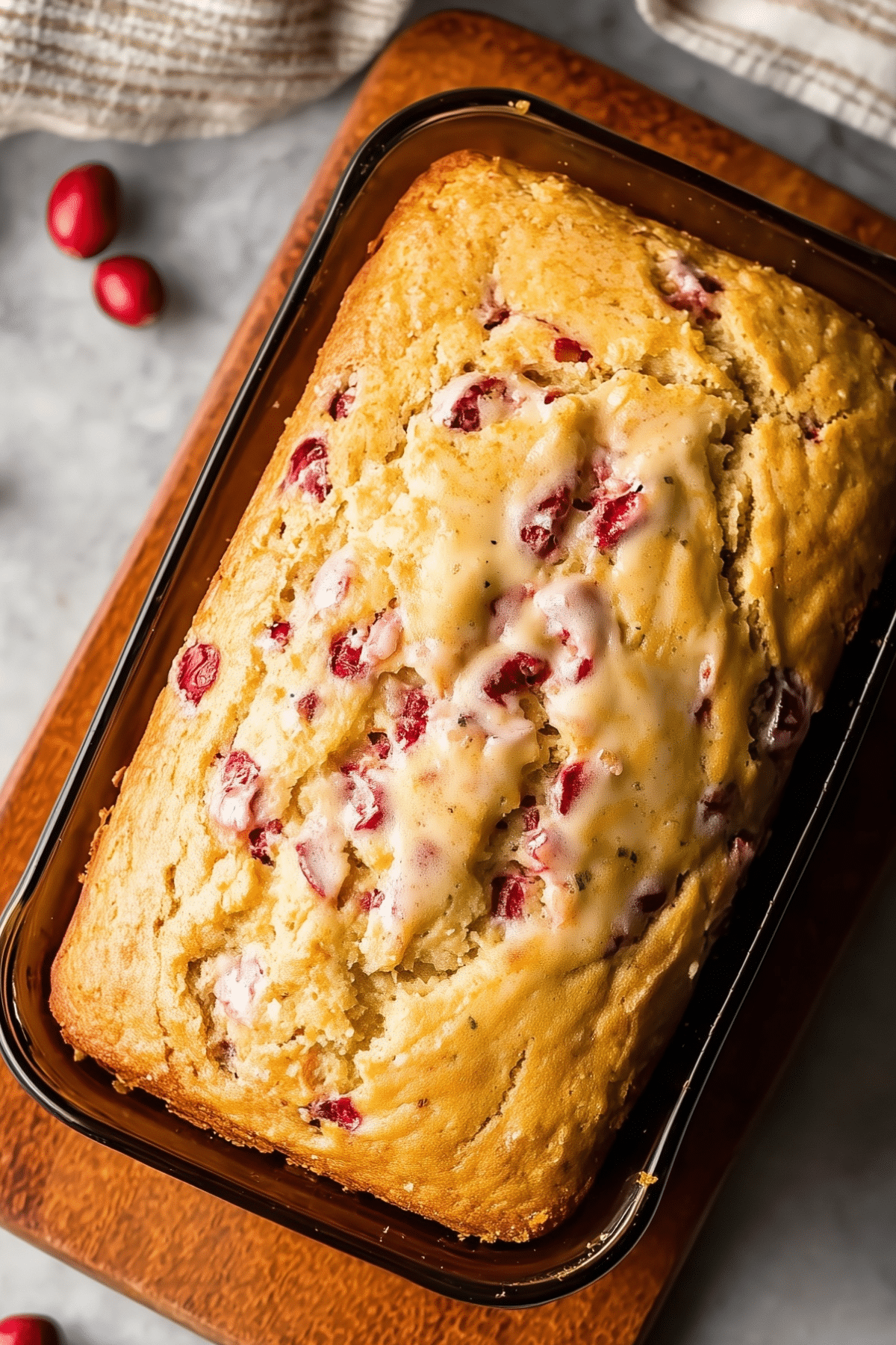 Moist and festive Cranberry Eggnog Bread with glaze