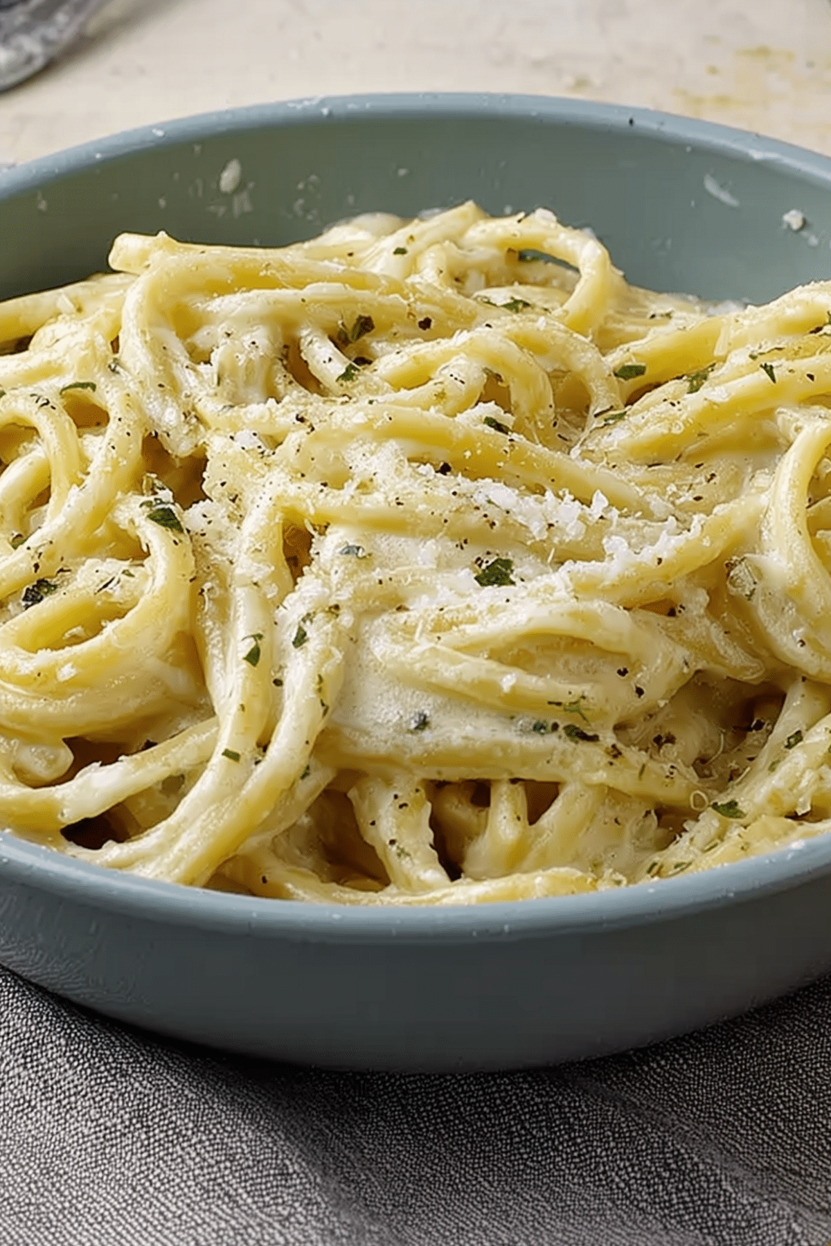 Creamy garlic pasta recipe with garlic, cream, and Parmesan cheese