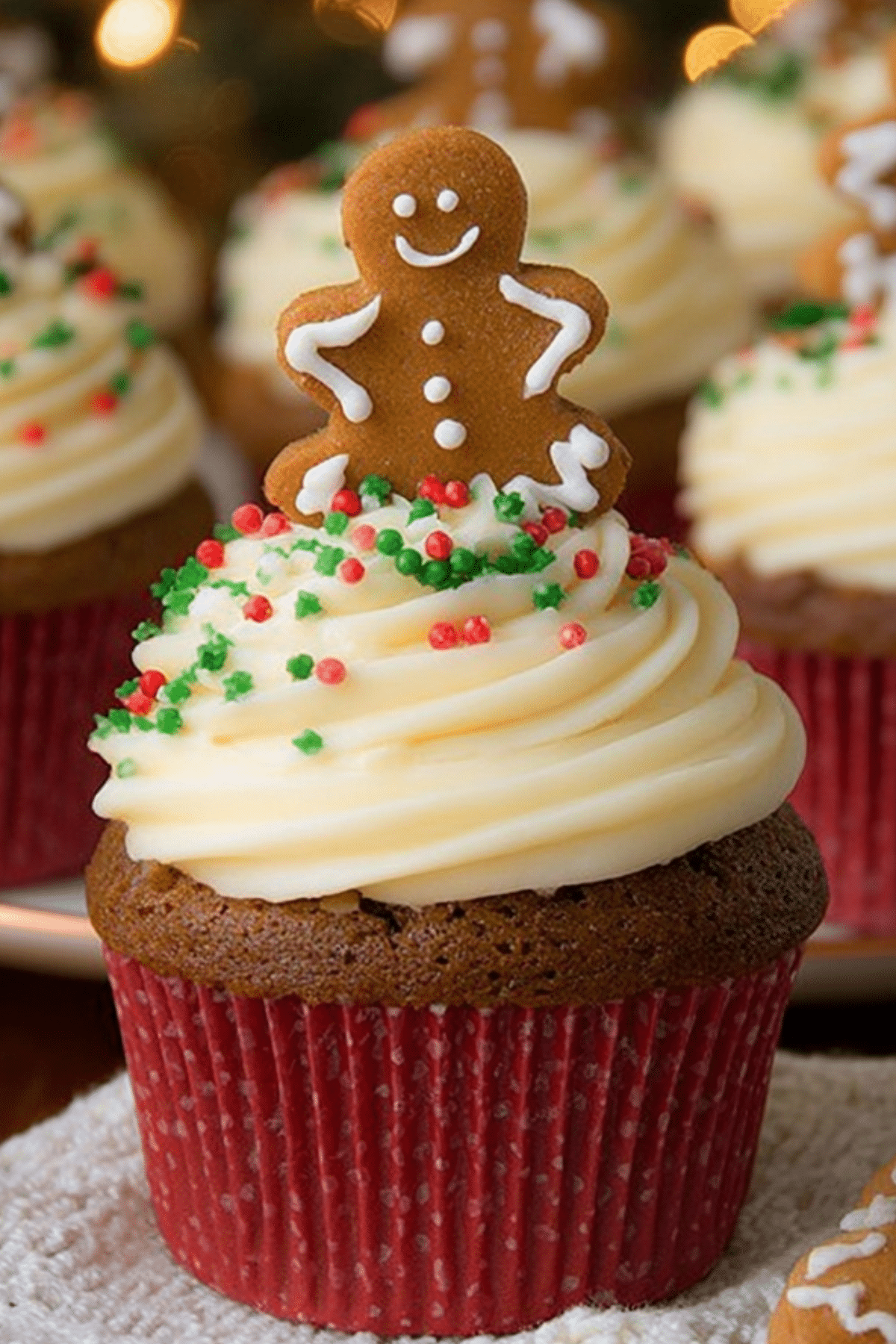 Gingerbread cupcakes with cream cheese frosting on a plate