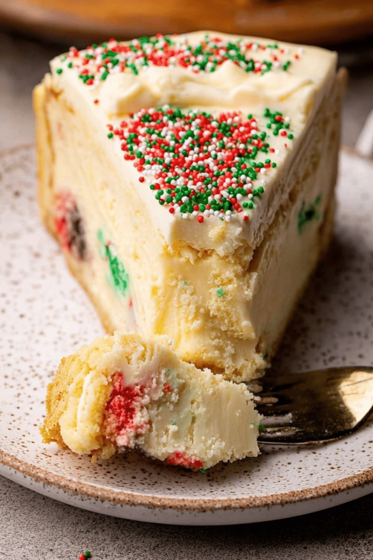 Sugar Cookie Cheesecake with edible cookie dough balls and white chocolate ganache