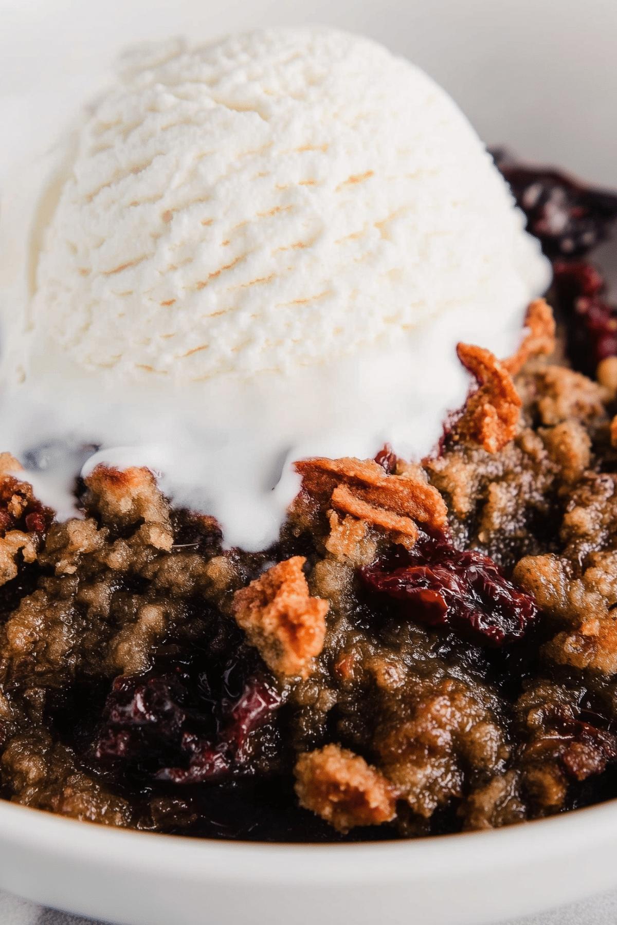 Berry Crisp Dump Cake with a buttery, crumbly topping and juicy berries