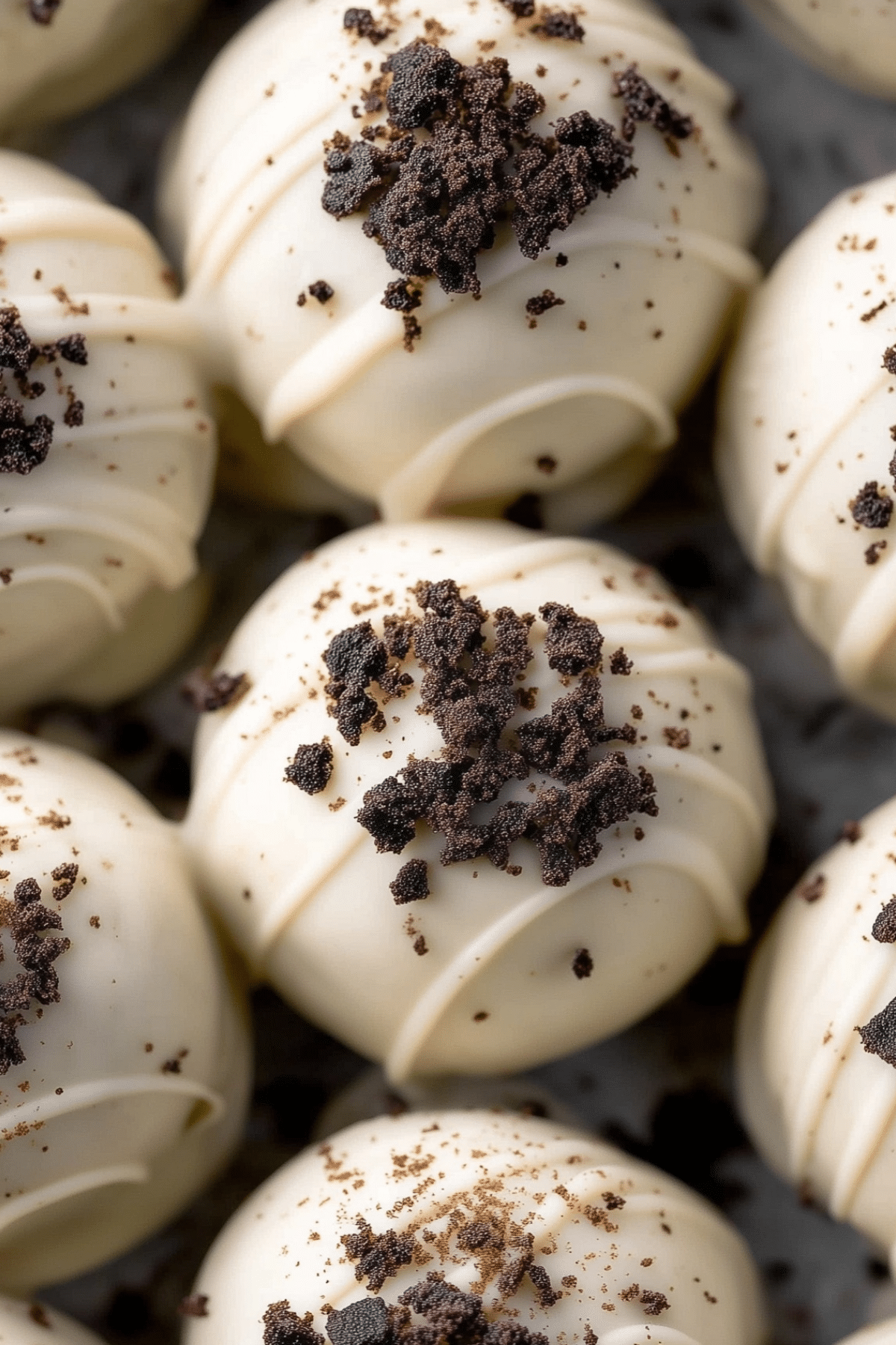 homemade oreo truffles on a white plate