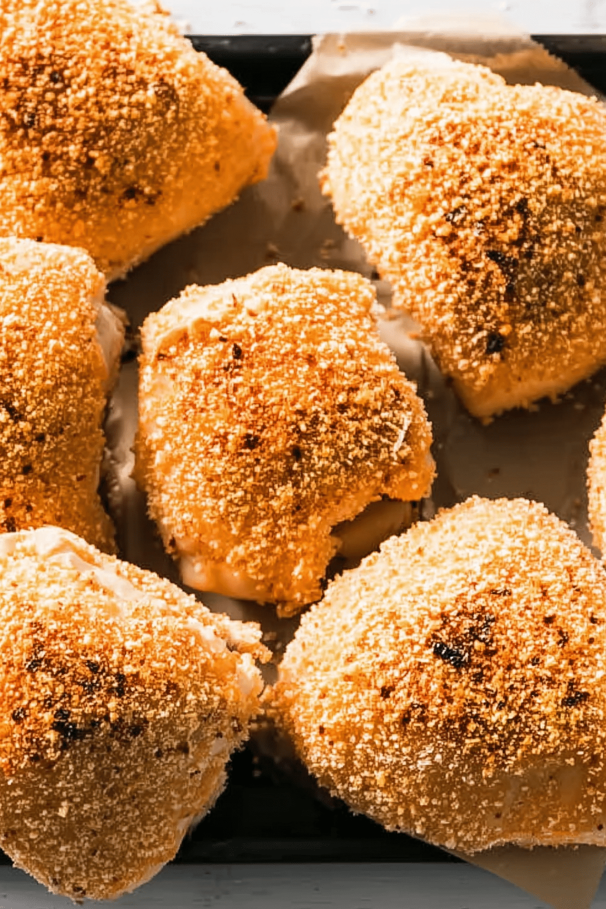 Crispy Baked Chicken Thighs on a baking sheet