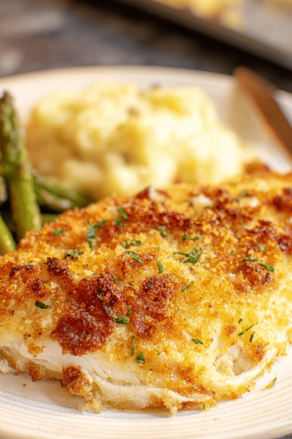 Longhorn Parmesan Crusted Chicken recipe with crispy Panko topping and creamy cheese sauce