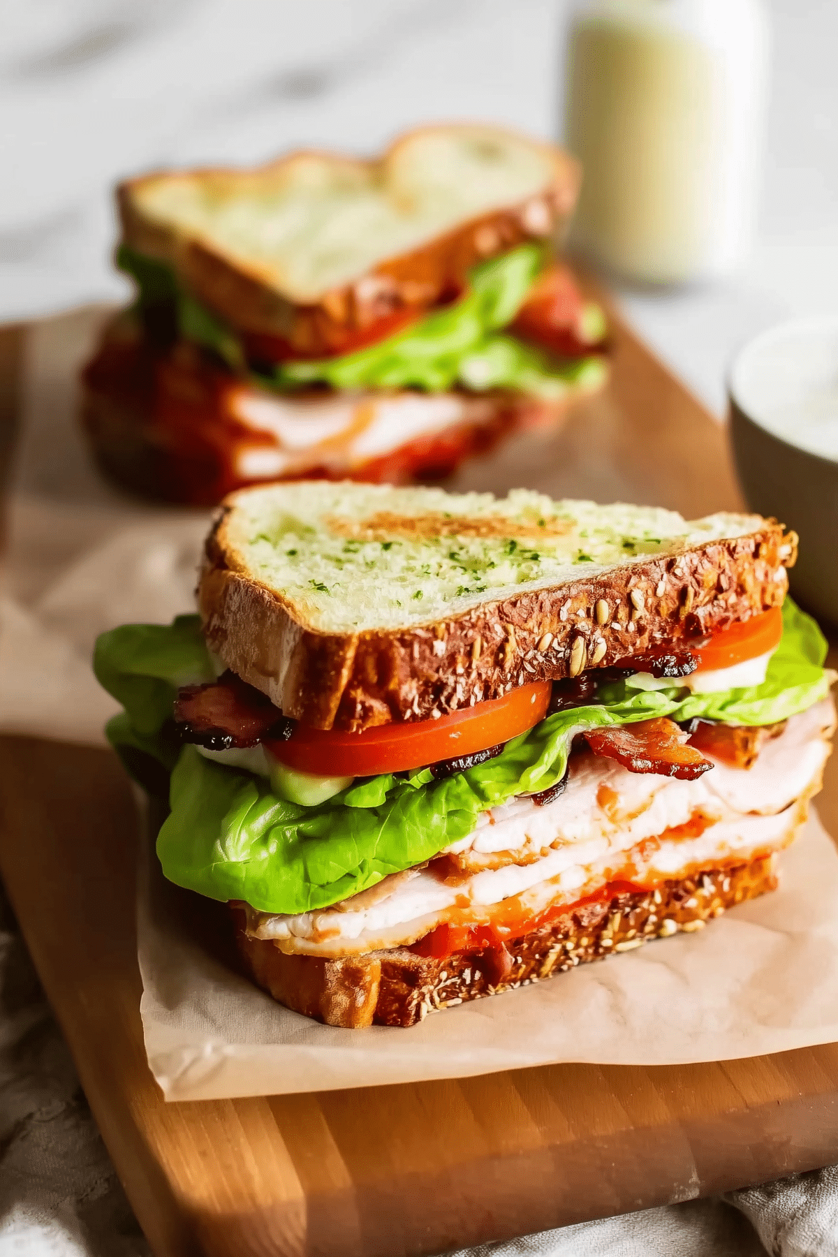 Turkey Club Sandwich with crispy bacon and fresh vegetables